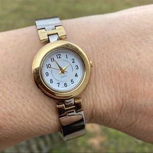 Gold and silver tone bracelet watch